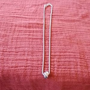 Artisan made silver bead necklace.